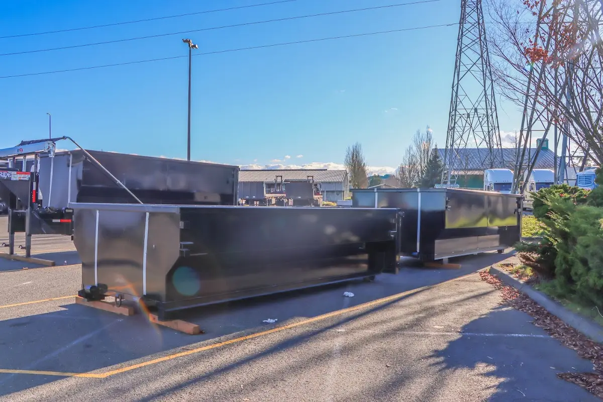 Roll-off dumpster ready for waste disposal at job site for 15 Yard Dumpster Rental in Heath
